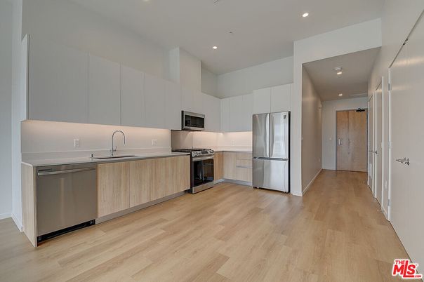 Interior, Kitchen, Recessed Lighting, Stainless Steel Appliances, Wood Texture Flooring