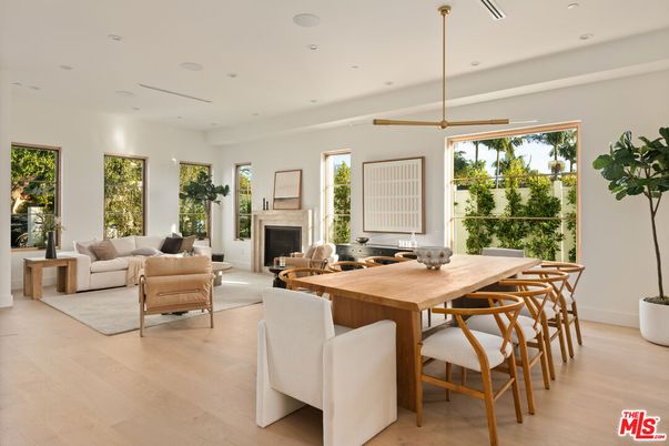 Dining room, Fireplace, Interior, Living room, Pendant Lights, Recessed Lighting, Wood Texture Flooring