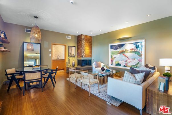 Dining room, Fireplace, Interior, Living room, Pendant Lights, Recessed Lighting, Wood Texture Flooring