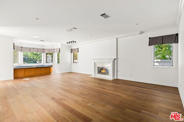 Empty room, Fireplace, Interior, Pendant Lights, Recessed Lighting, Wood Texture Flooring