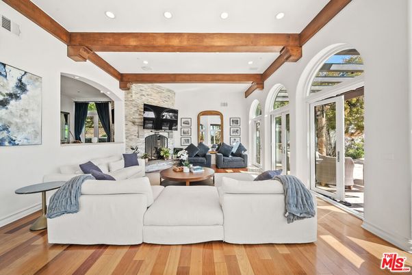 Fireplace, Interior, Living room, Recessed Lighting, Stone Walls, Wooden Beams, Wood Texture Flooring