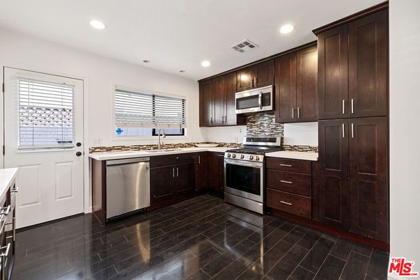Interior, Kitchen, Recessed Lighting, Stainless Steel Appliances, Wood Texture Flooring