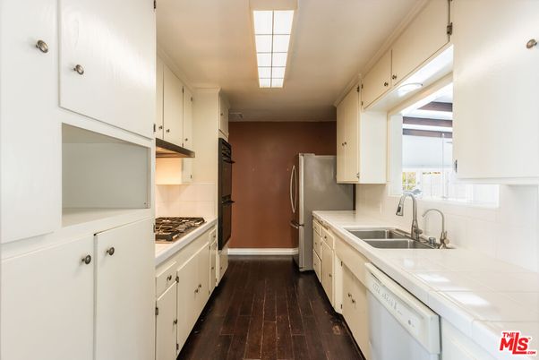 Interior, Kitchen, Tile Countertops, Wood Texture Flooring