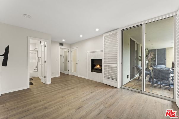 Empty room, Fireplace, Interior, Recessed Lighting, Wood Texture Flooring