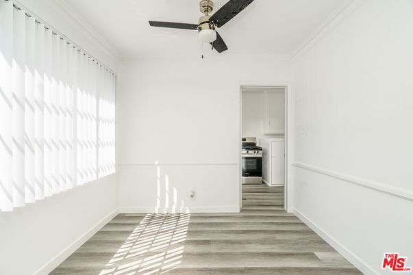 Empty room, Interior, Kitchen, Stainless Steel Appliances, Wood Texture Flooring
