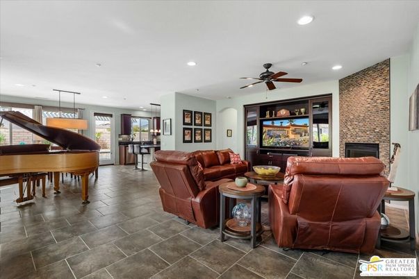 Fireplace, Interior, Living room, Pendant Lights, Piano, Recessed Lighting, Stone Walls