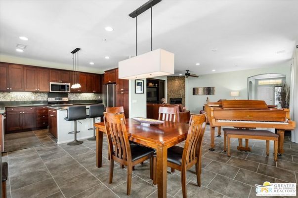 Dining room, Interior, Kitchen, Pendant Lights, Piano, Recessed Lighting, Stainless Steel Appliances