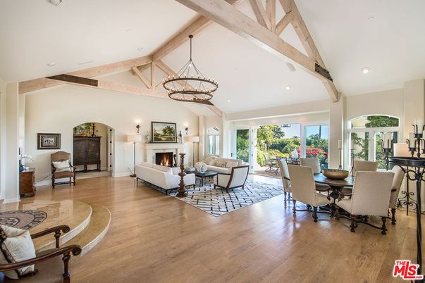Chandelier, Dining room, Fireplace, Interior, Living room, Pendant Lights, Recessed Lighting, Wooden Beams, Wood Texture Flooring