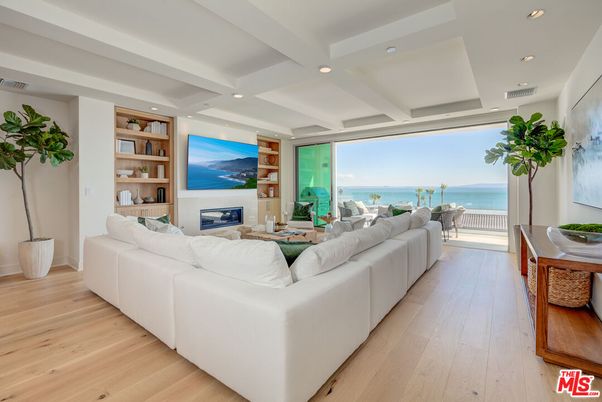 Fireplace, Interior, Living room, Recessed Lighting, Water, Wood Texture Flooring
