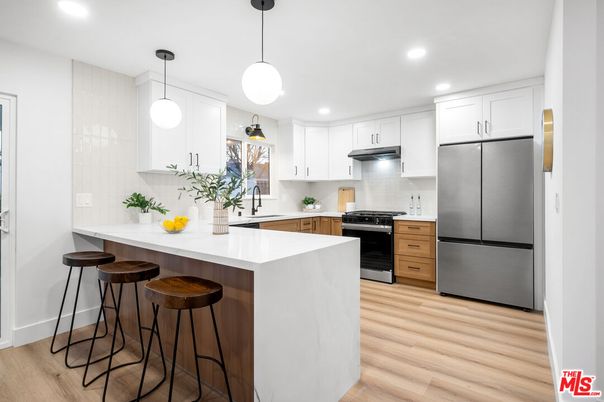 Interior, Kitchen, Pendant Lights, Recessed Lighting, Stainless Steel Appliances, Wood Texture Flooring
