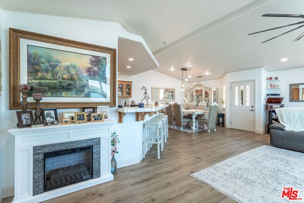 Dining room, Fireplace, Interior, Pendant Lights, Recessed Lighting, Wood Texture Flooring