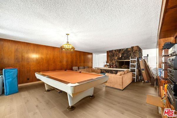 Billiard Table, Fireplace, Game Room, Interior, Living room, Wood Texture Flooring, Wooden Walls