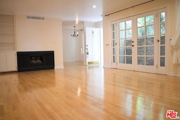 Chandelier, Empty room, Fireplace, Interior, Recessed Lighting, Wood Texture Flooring