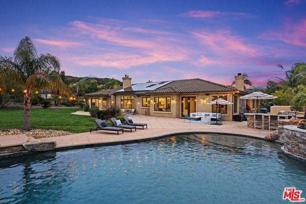 Exterior, Pool, Solar Panels