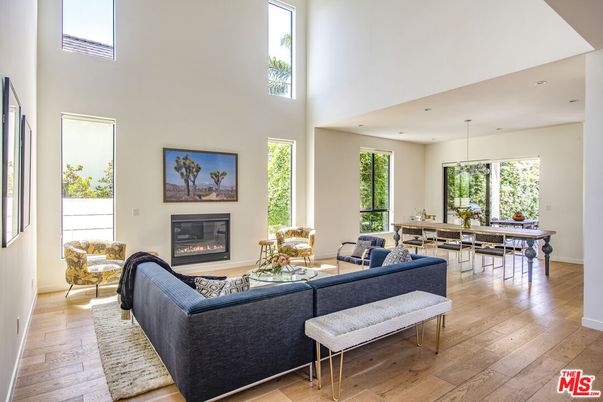 Dining room, Fireplace, Interior, Living room, Pendant Lights, Recessed Lighting, Wood Texture Flooring