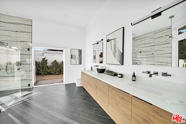 Bathroom, Dual Sink Vanities, Glass Shower, Interior, Pendant Lights, Wood Texture Flooring