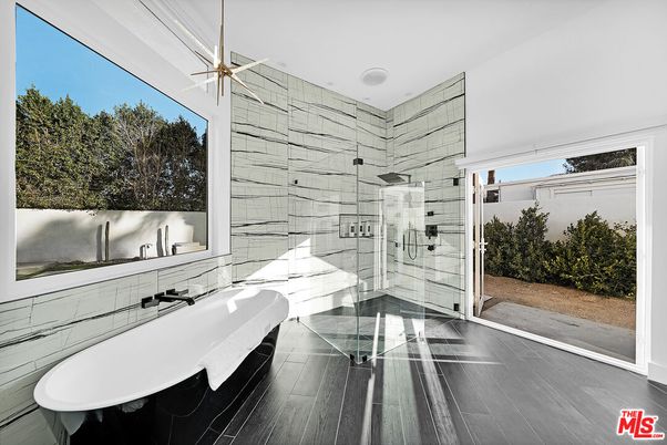 Bathroom, Free Standing Baths, Glass Shower, Interior, Recessed Lighting, Wood Texture Flooring