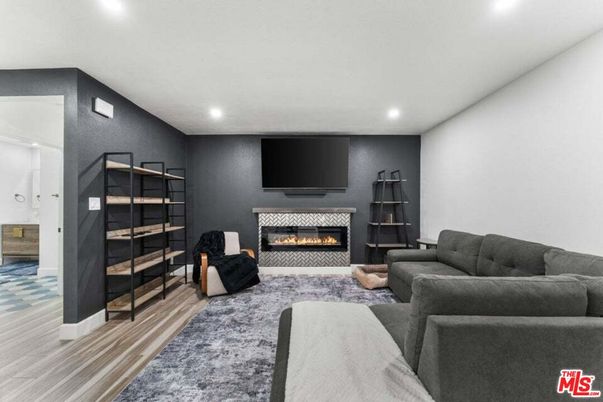Fireplace, Interior, Living room, Recessed Lighting, Wood Texture Flooring