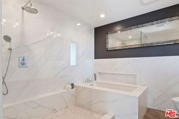 Bathroom, Glass Shower, Interior, Marble Walls, Recessed Lighting, Wood Texture Flooring