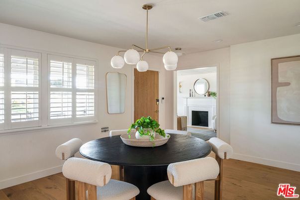 Dining room, Fireplace, Interior, Pendant Lights, Wood Texture Flooring