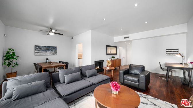 Dining room, Fireplace, Interior, Living room, Recessed Lighting, Wood Texture Flooring