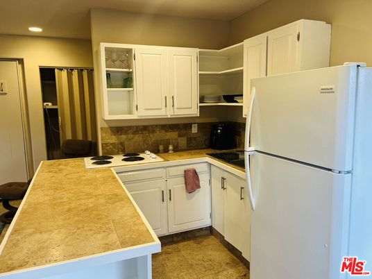 Interior, Kitchen, Recessed Lighting, Tile Countertops