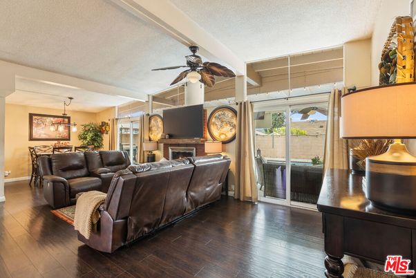 Dining room, Fireplace, Interior, Living room, Pendant Lights, Wood Texture Flooring