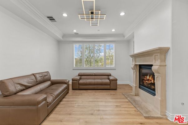 Fireplace, Interior, Pendant Lights, Recessed Lighting, Wood Texture Flooring