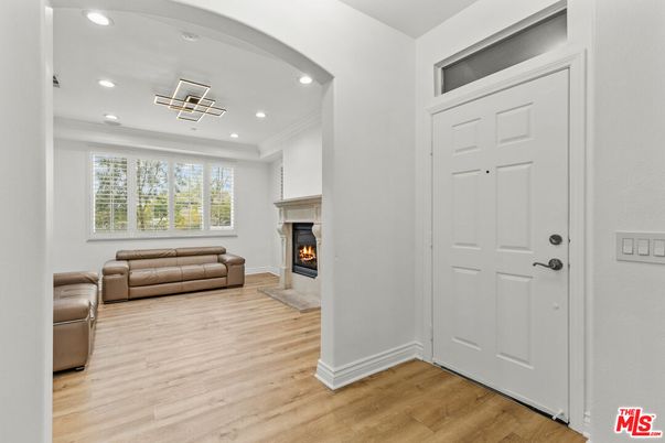 Fireplace, Interior, Living room, Recessed Lighting, Wood Texture Flooring