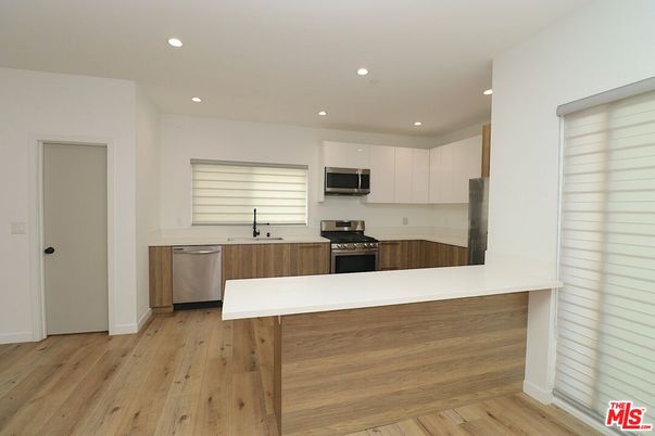 Interior, Kitchen, Recessed Lighting, Stainless Steel Appliances, Wood Texture Flooring