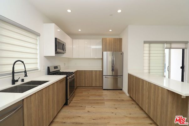 Interior, Kitchen, Recessed Lighting, Stainless Steel Appliances, Wood Texture Flooring