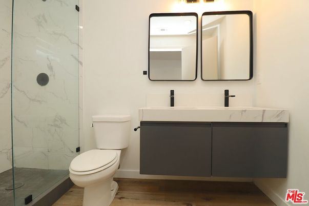 Bathroom, Glass Shower, Interior, Marble Walls, Wood Texture Flooring
