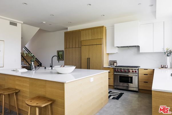 Interior, Kitchen, Marble Walls, Recessed Lighting, Stainless Steel Appliances