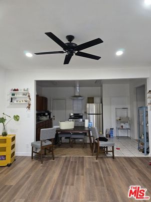 Dining room, Interior, Kitchen, Recessed Lighting, Stainless Steel Appliances, Wood Texture Flooring