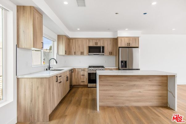 Interior, Kitchen, Recessed Lighting, Stainless Steel Appliances, Wood Texture Flooring