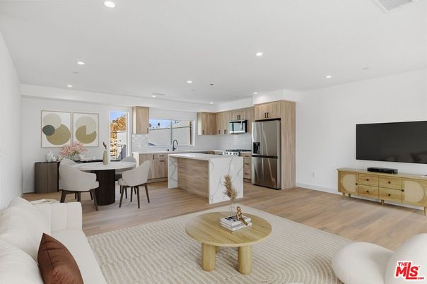 Dining room, Interior, Kitchen, Living room, Recessed Lighting, Stainless Steel Appliances, Wood Texture Flooring
