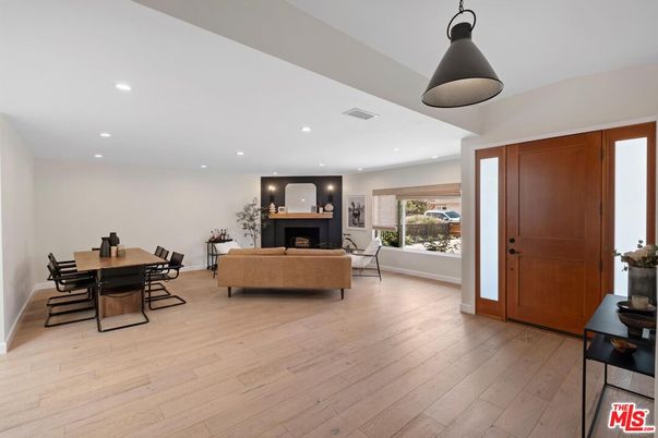 Dining room, Fireplace, Interior, Living room, Recessed Lighting, Wood Texture Flooring