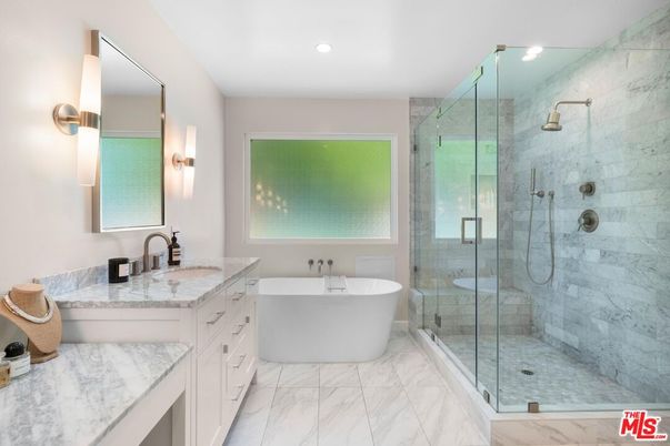 Bathroom, Dual Sink Vanities, Free Standing Baths, Glass Shower, Interior, Marble, Marble Walls, Recessed Lighting
