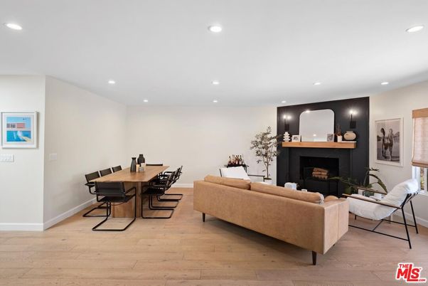 Dining room, Fireplace, Interior, Living room, Recessed Lighting, Wood Texture Flooring