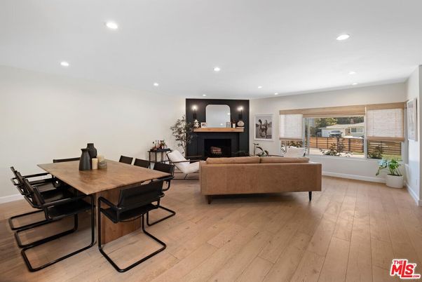 Dining room, Fireplace, Interior, Living room, Recessed Lighting, Wood Texture Flooring