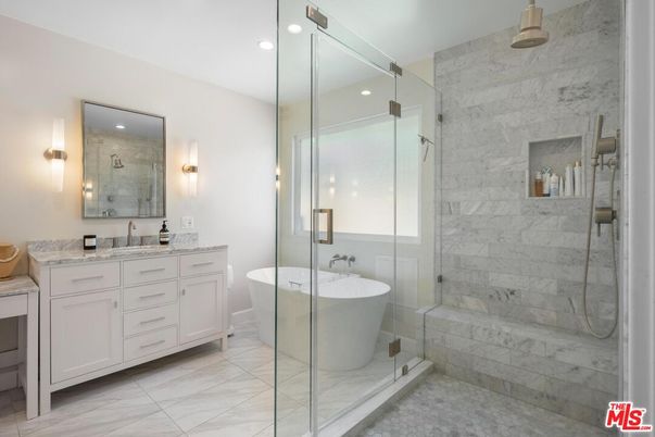 Bathroom, Dual Sink Vanities, Free Standing Baths, Glass Shower, Interior, Marble, Marble Walls, Recessed Lighting