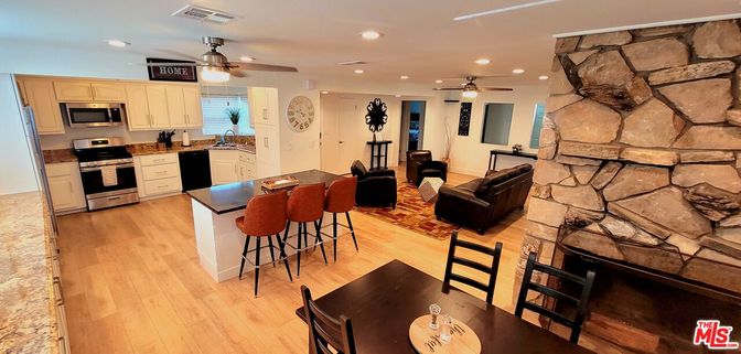 Interior, Kitchen, Living room, Recessed Lighting, Stainless Steel Appliances, Stone Walls, Wood Texture Flooring