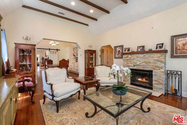 Chandelier, Fireplace, Interior, Living room, Recessed Lighting, Wooden Beams, Wood Texture Flooring
