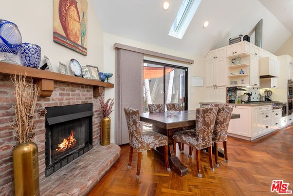 Dining room, Fireplace, Interior, Kitchen, Recessed Lighting, Stone Walls, Wood Texture Flooring