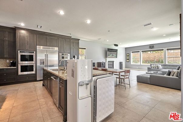 Dining room, Fireplace, Interior, Kitchen, Living room, Recessed Lighting, Stainless Steel Appliances