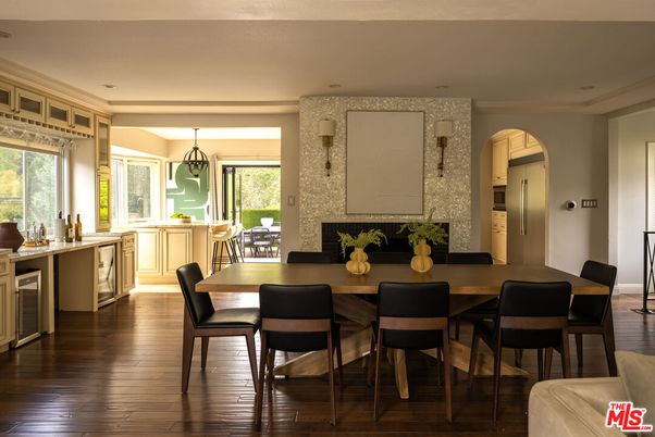 Dining room, Fireplace, Interior, Kitchen, Pendant Lights, Recessed Lighting, Stainless Steel Appliances, Wood Texture Flooring
