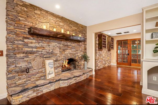 Fireplace, Interior, Recessed Lighting, Stone Walls, Wood Texture Flooring