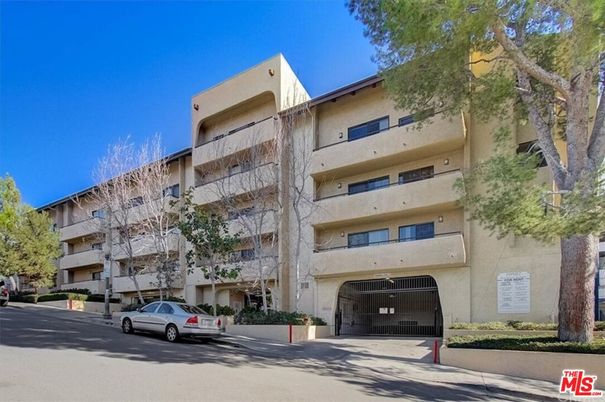Attached, Exterior, Facade, Condo Building