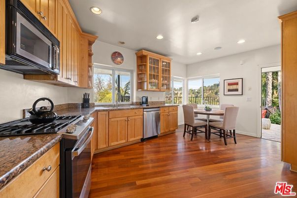 Dining room, Interior, Kitchen, Recessed Lighting, Stainless Steel Appliances, Wood Texture Flooring