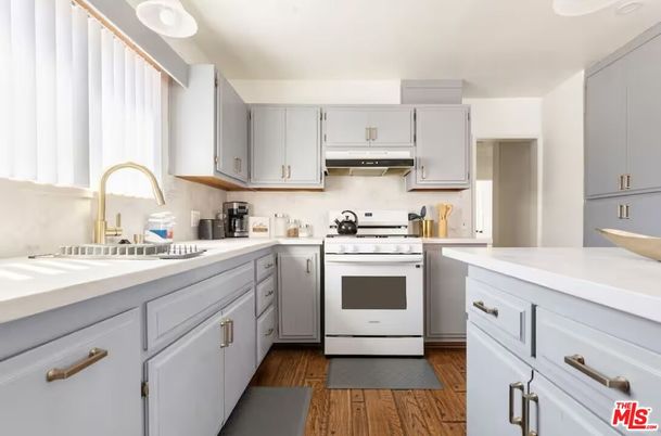 Interior, Kitchen, Stainless Steel Appliances, Tile Countertops, Wood Texture Flooring